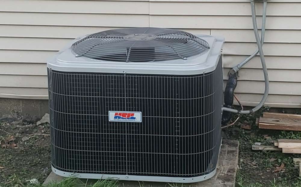 new-ac-unit-for-house A new condenser for air conditioning at a house